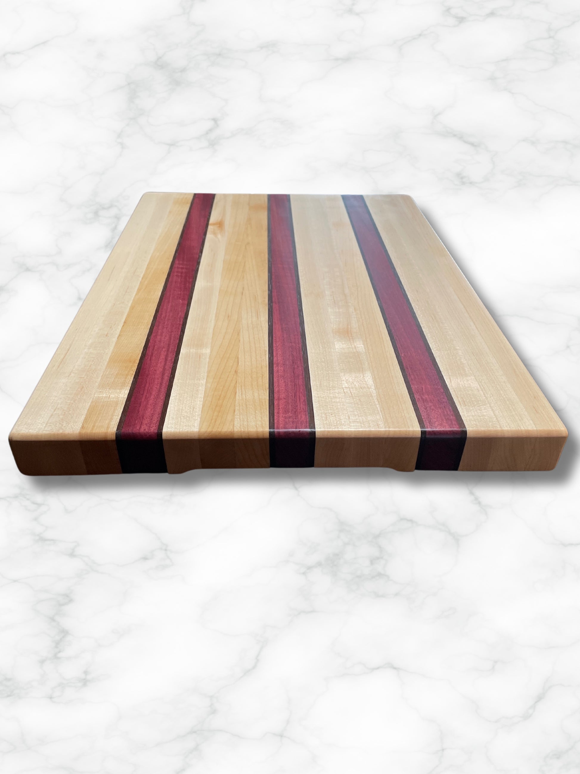custom handmade edge grain maple purpleheart walnut wood cutting board, top view