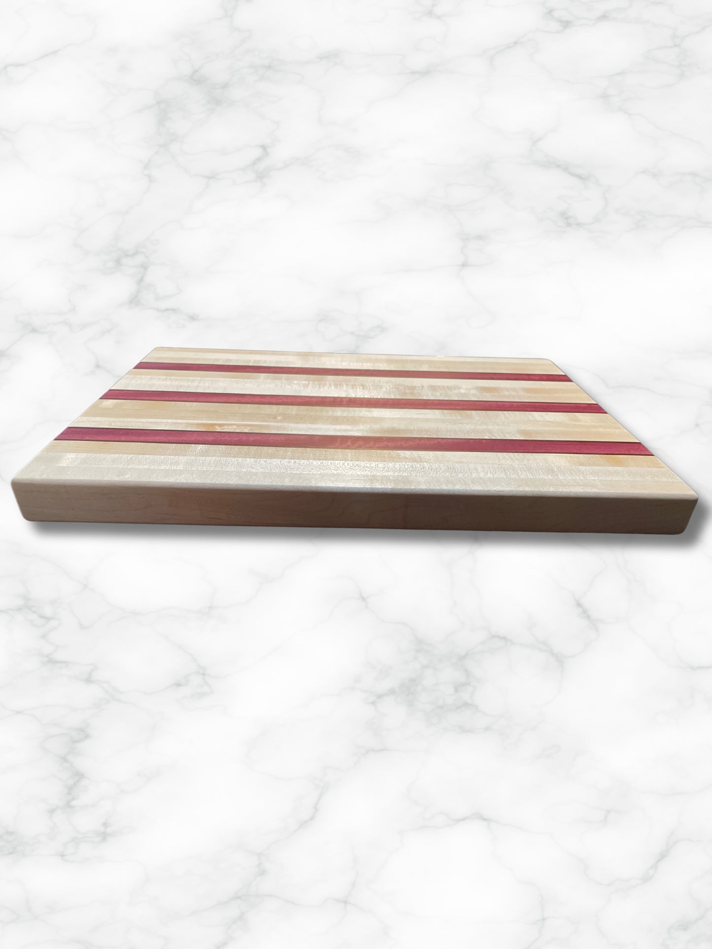 custom handmade edge grain maple purpleheart walnut wood cutting board, front view